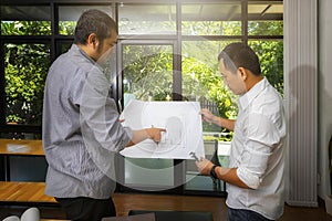 Confident team of architect working together in a office.