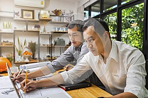 Confident team of architect working together in a office.