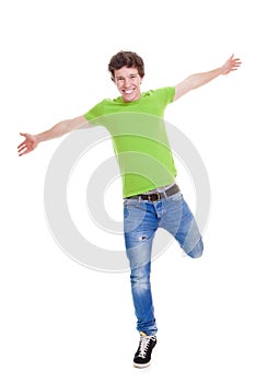Confident teen arms outstretched photo