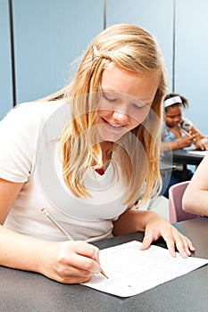 Confident Teen Girl Taking Test