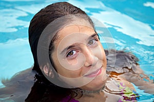 Confident Tween Girl In Swimming Pool