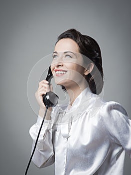 Confident vintage secretary on the phone