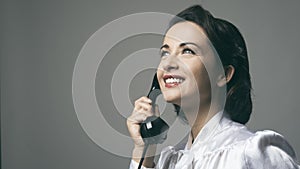 Confident vintage secretary on the phone