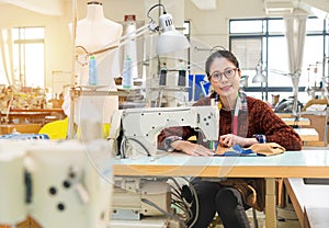 Confident woman employee looking at camera