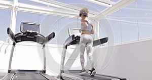 Confident woman training in gym