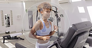 Confident woman training in gym