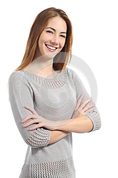 Confident woman with white smile standing with folded arms