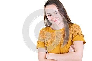 Confident woman young caucasian woman in yellow shirt casually standing