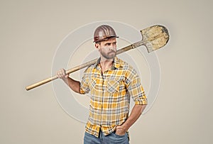 Confident worker. mature builder in shirt. unshaven man on construction site. handsome building worker in hard hat