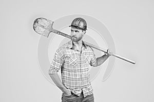 Confident worker. mature builder in shirt. unshaven man on construction site. handsome building worker in hard hat