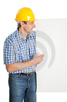 Confident worker presenting empty board