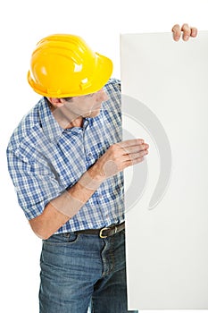 Confident worker presenting empty board