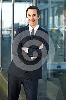 Confident young business man smiling outdoors