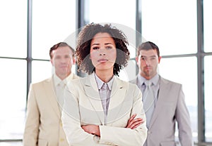 Confident young businesswoman in office