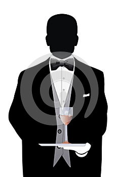 Confident young butler in tuxedo holding blank card on tray photo