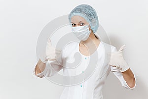 Confident young doctor woman with face mask, sterile hat, gloves isolated on white background. Female surgeon doctor in