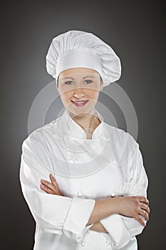 Confident young female chef