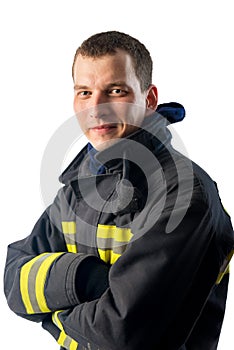 confident young Fireman on white background