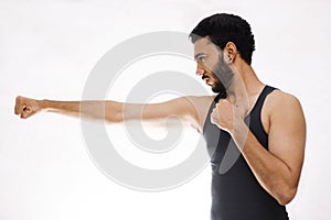 Confident Young Fitness Man With Strong Hands And Clenched Fists