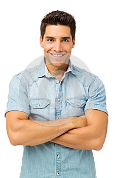 Confident Young Man Standing Arms Crossed