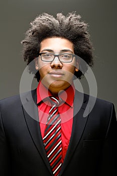 Confident young teenager with afro