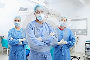 Confident in your recovery. Portrait of a confident and serious team of medical surgeons.