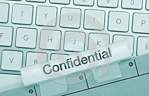 Confidential - Inscription on Blue Keyboard Key
