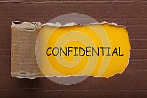 Confidential under torn paper