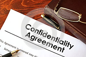 Confidentiality Agreement form on a table.