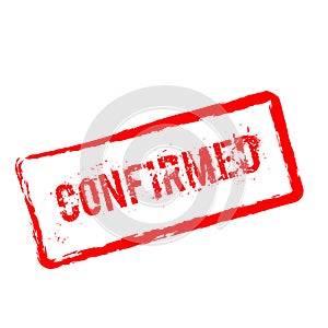 Confirmed red rubber stamp isolated on white.