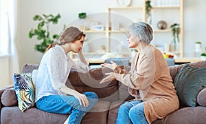 Conflict of family two generations old mother and adult daughter