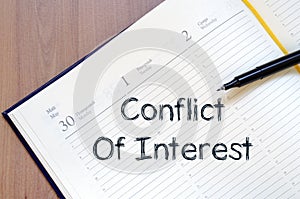 Conflict of interest write on notebook