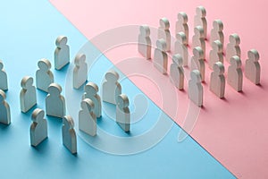 The conflict between the two business teams. One group of people stands as a unit, and the other group of people stands as a crowd