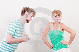 Man asking for forgivness. Conflicted couple photo