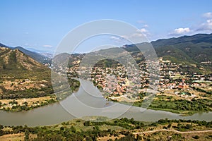 Confluence of the Mtkvari and Aragvi rivers viewed from above at Mtskheta - one of the oldest cities in Georgia - and view of the