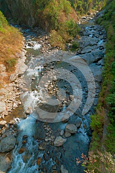 Nice river water flowing through rocks , Sikkim photo