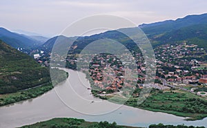 Confluence of two rivers Kura and Aragvi. Mtskheta, an ancient city of Georgia. Travel to the sights of the Caucasus