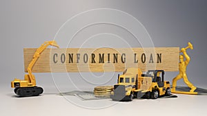 Conforming loan written on wooden surface. economy and business