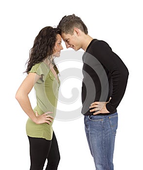 Confrontation - young standing couple photo