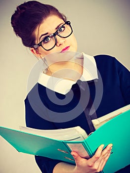 Confused business woman thinking about problem solution