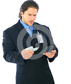 Confused Businessman Holding Money And Calculator