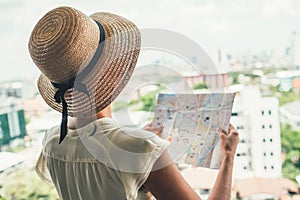 Confused female with destination map