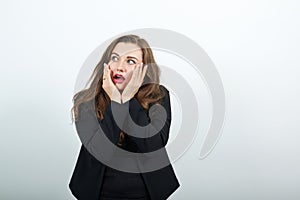 Confused Female Holds Face With Her Hands, Looks Surprised. Shock, Suddenness