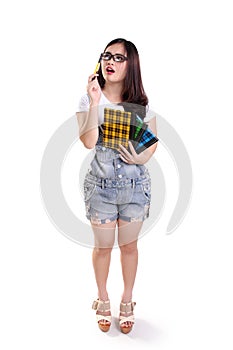 Confused geeky girl, full body isolated