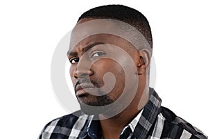 Confused man against white background