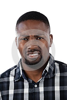 Confused man against white background