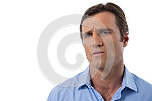 Confused man against white background