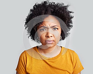 Confused, portrait and woman in studio, pensive and unsure against a grey background. Doubt, annoyed and face of African