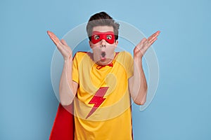 Confused superhero man with funny face