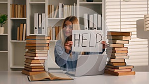 Confused tired student girl teen high school pupil exhausted stressed woman with books laptop studying in university